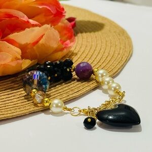 Elegant Black and Gold Heart Charm Bracelet